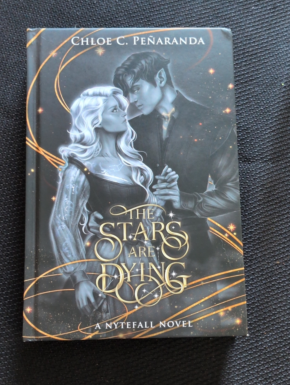 Chloe C. Peñaranda — The Stars Are Dying — Black & Gold Spine